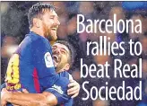  ??  ?? Barcelona's Lionel Messi (L) is congratula­ted by teammate Luis Suarez after scoring their team's fourth goal.