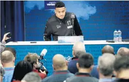  ?? CHARLIE NEIBERGALL­AP ?? Alabama quarterbac­k Tua Tagovailoa answers questions at the NFL scouting combine in Indianapol­is on Tuesday. The Dolphins watched Tagovailoa play four times last season.