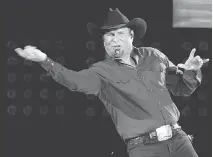  ?? JULIE JACOBSON/THE ASSOCIATED PRESS/FILES ?? Country superstar Garth Brooks could be in line for his second straight entertaine­r of the year award after wrapping his three-year tour earlier this year.