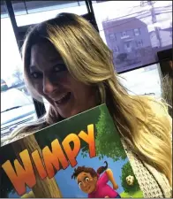  ??  ?? Christina Rondeau, a Woonsocket native and karate instructor with a studio in Johnson, recently published a children’s book, “Wimpy,” about a third-grader who learns karate.