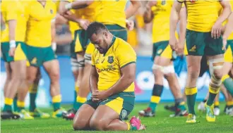  ?? Picture: CHRIS HYDE/GETTY IMAGES ?? Taniela says a prayer after the Wallabies held on grimly to overcome South Africa in Brisbane last weekend.