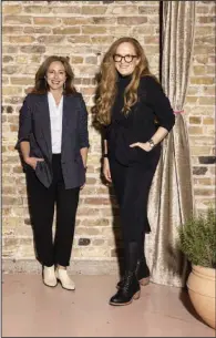  ?? (The New York Times/Jenn Ackerman) ?? Allison Kaplan (left) and Betsey Kershaw, founders of Mother Of, are seen at a wedding showcase in St. Paul, Minn., in November. The online resource is designed to help mothers or mother figures find the perfect look for their children’s weddings.