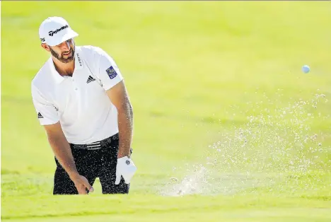  ?? PHOTOS: ANDY LYONS/GETTY IMAGES ?? Dustin Johnson has a one-stroke lead after two rounds at the St. Jude Classic after firing a 7-under 63 on Friday.