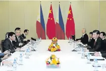  ??  ?? Xi Jinping meets with Duterte on the sidelines of the Asia-Pacific Economic Cooperatio­n Economic Leaders’ Meeting in Lima, Peru on November 19, 2016.