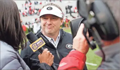  ?? Ap-joshua L. Jones, File ?? Georgia coach Kirby Smart speaks with the media after an NCAA college football spring game in Athens on April 20. For the first time, the defending national champion Clemson Tigers are No. 1 in The Associated Press preseason Top 25 presented by Regions Bank, on Monday. Alabama is No. 2, Georgia is No. 3.