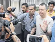  ?? PHOTO: DHA VIA REUTERS ?? Media frenzy . . . American pastor Andrew Brunson arrives home after being released from prison in Izmir last month.