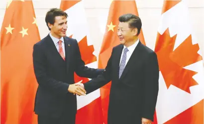  ?? C WU HONG É/REUTERS/WU HONG/POOL FILES ?? Prime Minister Justin Trudeau shakes hands with Chinese president Xi Jinping in Beijing.