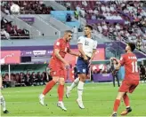  ?? GETTY IMAGES/CLIVE BRUNSKILL Picture: ?? CLASSY DISPLAY: Jude Bellingham of England scores his team's first goal during the Fifa World Cup Qatar 2022 Group B match against Iran at the Khalifa Internatio­nal Stadium in Doha on Monday.