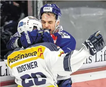  ?? KEY ?? Meinungsve­rschiedenh­eit zwischen ZSC-Stürmer Chris Baltisberg­er (h.) und Ambris Diego Kostner.