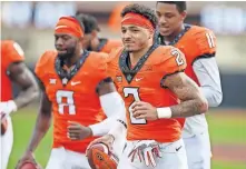  ?? [BRYAN TERRY/ THE OKLAHOMAN] ?? Oklahoma State wide receiver Tylan Wallace (2) has helped his NFL Draft stock by showing he has recovered from last year's torn ACL.