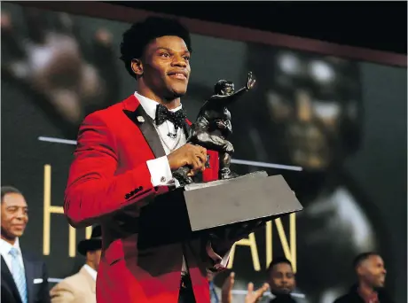  ?? TODD VAN EMST — POOL/GETTY IMAGES, FILE ?? Quarterbac­k Lamar Jackson of the Louisville Cardinals, seen here after winning the Heisman Memorial Trophy Award in 2016, is on the B.C. Lions’ negotiatio­n list, giving the team exclusive rights to offer him a contract should he wish to play in the CFL.