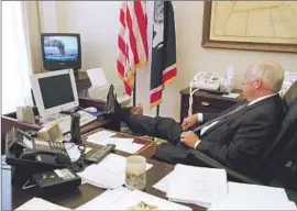  ?? David Bohrer U.S. National Archives ?? VICE PRESIDENT Dick Cheney watches news coverage. White House photograph­er David Bohrer ran to Cheney’s office when he heard about the attacks.