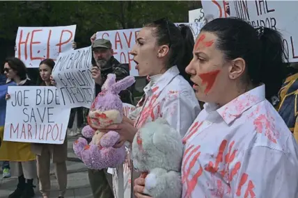  ?? Getty Images/Genya Savilov ?? Get out: An antiwar rally in Kyiv on April 27. Companies have been under pressure to withdraw from Russia