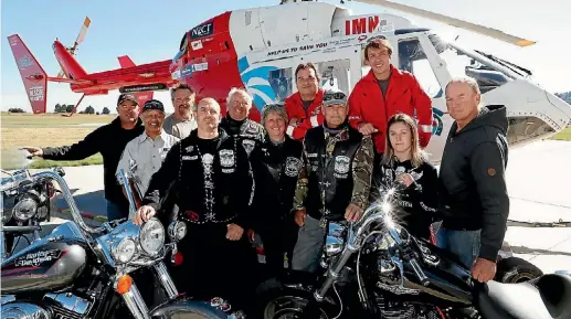  ?? PHOTO: MARTIN DE RUYTER/ FAIRFAX
NZ ?? Brightwate­r
Rural Fire Fighters
Matthew Bensemann, left, Janti Makan and Harry Fabeir with disbanded Patriots Motorcycle Club members Paul Marsden, forth from left, Peter McKenzie, Nicola McKenzie,
Robert Crimp, Jodie Marsden and Paul Claridge with...