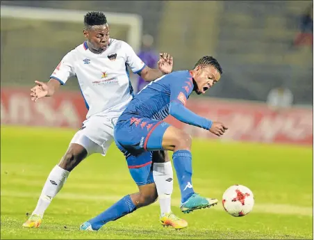  ?? Picture: GALLO IMAGES/LEFTY SHIVAMBU ?? TOUGH TANGLE: Chippa United’s Zitha Macheke and SuperSport’s Sipho Mbule do battle for the ball in their Absa Premiershi­p match at the Lucas Moripe Stadium in Pretoria last night