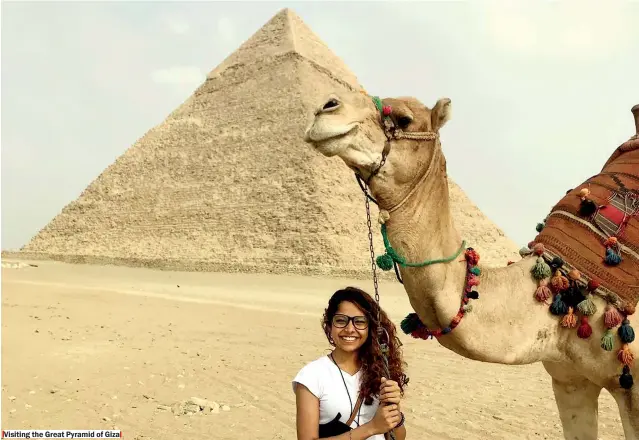  ??  ?? Visiting the Great Pyramid of Giza