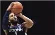  ?? Albert Cesare / Associated Press ?? UConn’s R.J. Cole hits a free throw with under a minute to play in the second half against Xavier on Saturday.