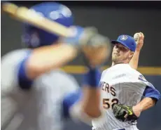  ?? ASSOCIATED PRESS ?? Jimmy Nelson will get the start for the Brewers as they open a three-game series against the Cubs on Friday night at Wrigley Field.