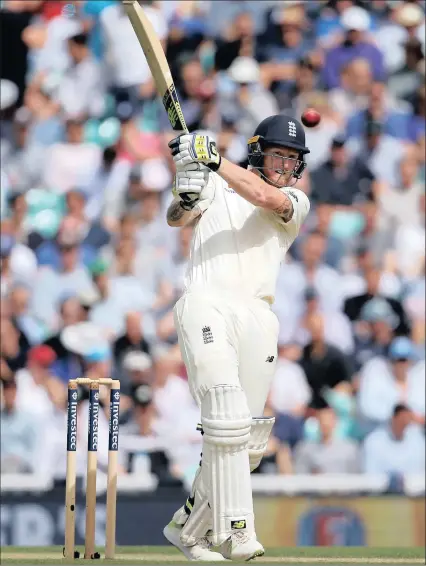  ??  ?? England’s Ben Stokes bludgeons one on his way to a fine century at The Oval yesterday.