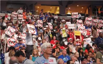  ?? AMY HE / CHINA DAILY ?? Opponents of the Trans-Pacific Partnershi­p gather at the Democratic National Convention in Philadelph­ia on Monday.