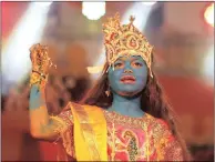  ?? PICTURE: REUTERS ?? A girl dressed up as Hindu Lord Krishna performs during Janmashtam­i festival celebratio­ns marking the birth of Lord Krishna in Ahmedabad, India, yesterday.