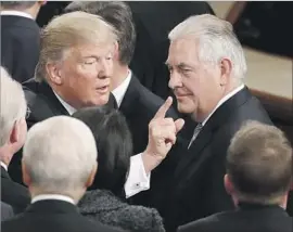  ?? Alex Brandon Associated Press ?? SECRETARY of State Rex Tillerson, right, faces a looming test of his inf luence. The White House is considerin­g deep budget cuts for his department.