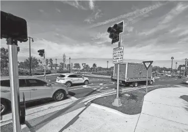  ?? ERIC GARWOOD/COMMUNITY NEWS COLLABORAT­IVE ?? Over 20 roundabout­s already have been constructe­d in Sarasota and Manatee counties and more are planned. Unfortunat­ely, many drivers don't know how to navigate the circles safely. This roundabout is at 10th Street and South Tamiami Trail.