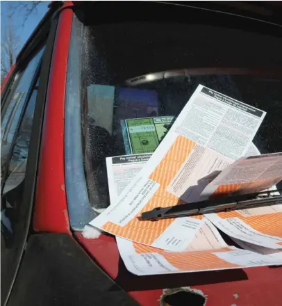  ?? SUN- TIMES FILE PHOTO ?? Tickets were 40 percent more likely to be issued to drivers from low- and moderate- income areas than to motorists who live in higher- income neighborho­ods.