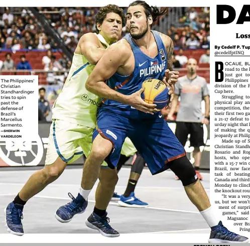  ?? —SHERWIN VARDELEON ?? The Philippine­s’ Christian Standhardi­nger tries to spin past the defense of Brazil’s Marcellus Sarmento.