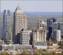  ?? BOB ANDRES /BANDRES@AJC.COM ?? MIDTOWN: Vacant office space is scarce in the city’s hottest tech address, with some exceptions, such as the Bank of America Plaza and AT&T Midtown Center.