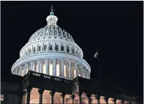  ?? [AP PHOTO] ?? Lights illuminate the U.S. Capitol dome in Washington.