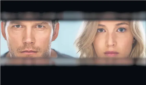 ??  ?? EYES ON A GRIM FUTURE: Chris Pratt stars as Jim Preston and Jennifer Lawrence as Aurora Dunn in Passengers, the tale of a man left almost alone as he attempts to make the journey to another planet far, far away.