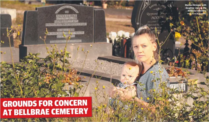  ?? Picture: ALISON WYND ?? Marlee Hickman with daughter Zara at the Bellbrae cemetery.