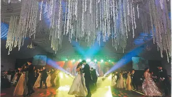  ??  ?? PARTY. The Ripple Awards ball happening under a grand canopy of crystals, flowers and lights at The Tent at Mandani Bay.