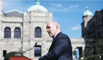  ?? THE CANADIAN PRESS ?? Premier John Horgan says his government had to act after a CTV W5 broadcast in which a federal fisheries department scientist expressed concern about the integrity of fish-farm research in B.C.