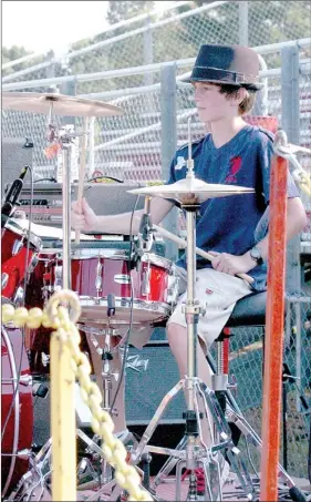  ?? PHOTOS BY MARK HUMPHREY ENTERPRISE-LEADER ?? Let freedom ring. Coleman Warren, of Farmington, lays down a rhythm track during Freedom Fest. Warren was performing with his band Xcluded, a five member group made up of incoming seventh graders.