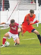  ?? Picture: Les Biggs ?? Whitstable’s Chris Saunders takes on Chatham keeper Ryan Nicholls