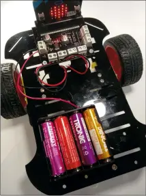  ??  ?? The finished robot car is really simple to make thanks largely to an off-the-shelf chassis and a motor driver built for the micro:bit.