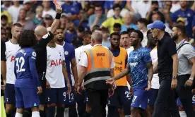  ?? Photograph: Ian Walton/AP ?? Anthony Taylor shows a red card to Thomas Tuchel but the German was more bothered about what he saw as mistakes by the referee and the VAR