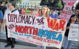  ?? REUTERS ?? Protesters call for peaceful negotiatio­ns with North Korea during a vigil in front of the White House in Washington on Wednesday.