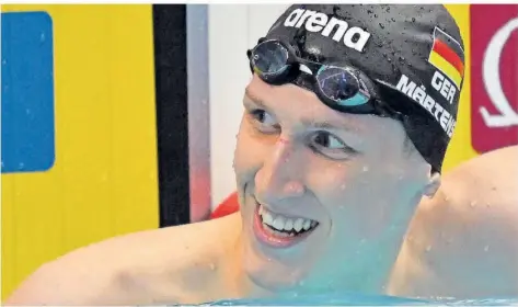  ?? FOTO: D‘ALBERTO/DPA ?? Lukas Märtens freut sich nach dem Anschlag über seine WM-Silbermeda­ille über die 400 Meter Freistil.