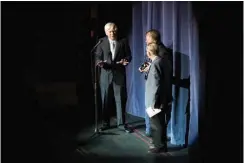  ?? Staff photo by Joshua Boucher ?? n David Mallette and Dr. John Tennison present the first “Boogie” to Rule Beasley Saturday night at the Perot Theatre. This is the first lifetime achievemen­t award given by the Regional Music Heritage Center.