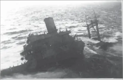  ?? Ena Farrell Edwards / Contribute­d photo ?? U.S.S. Pollux is distress on Lawn Point on Feb. 19, 1942