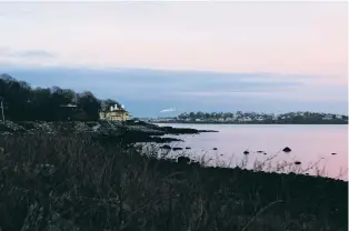  ?? ?? ABOVE: Marginal Road, a coyote hot spot in the coastal town of Nahant, Mass., is shown last week. Compact, densely populated and surrounded by water, Nahant is the first municipali­ty in Massachuse­tts to ask federal sharpshoot­ers to target problem coyotes.
