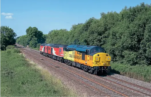  ??  ?? Colas 37057 Barbara Arbon hauls 43272 and 43277 past Stenson with the 5Z10 10.41 Burton Wetmore Sidings to Derby RTC working on July 17. Steve Donald