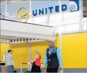  ?? Joshua Lott AFP/Getty Images ?? NONE of United Airlines’ 10 policy changes are particular­ly groundbrea­king or even surprising. Above, the United terminal at O’Hare Internatio­nal Airport.