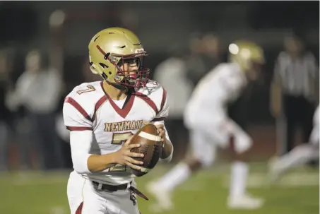  ?? Carlos Avila Gonzalez / The Chronicle ?? Quarterbac­k Beau Barrington completed 21 of 33 passes for 243 yards in Cardinal Newman’s loss to Rancho Cotate.