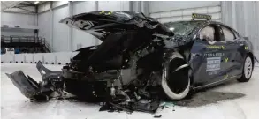  ??  ?? RUCKERSVIL­LE: A Tesla car is seen after a crash test at the Insurance Institute of Highway Safety in Ruckersvil­le, Virginia.