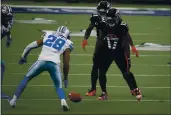  ?? RON JENKINS — THE ASSOCIATED PRESS ?? Dallas Cowboys cornerback C.J. Goodwin (29) follows a Cowboys onside kick as the Atlanta Falcons’ Olamide Zaccheaus (17) looks on in the second half Sunday in Arlington, Texas. Goodwin recovered the kick.