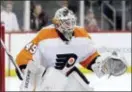  ?? JULIO CORTEZ — THE ASSOCIATED PRESS ?? Goalie Alex Lyon, seen in one of 11 games with the Flyers this season, made 94 saves in a record-setting, five-overtime win for the Lehigh Valley Phantoms Wednesday.